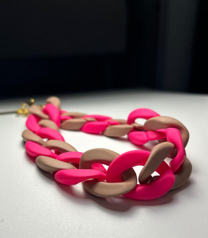 Sangle de poignet de téléphone grosses mailles rose fluo/marron clair